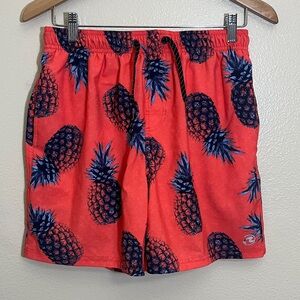 Ocean Current Red Blue Pineapple Tropical Swim Trunks